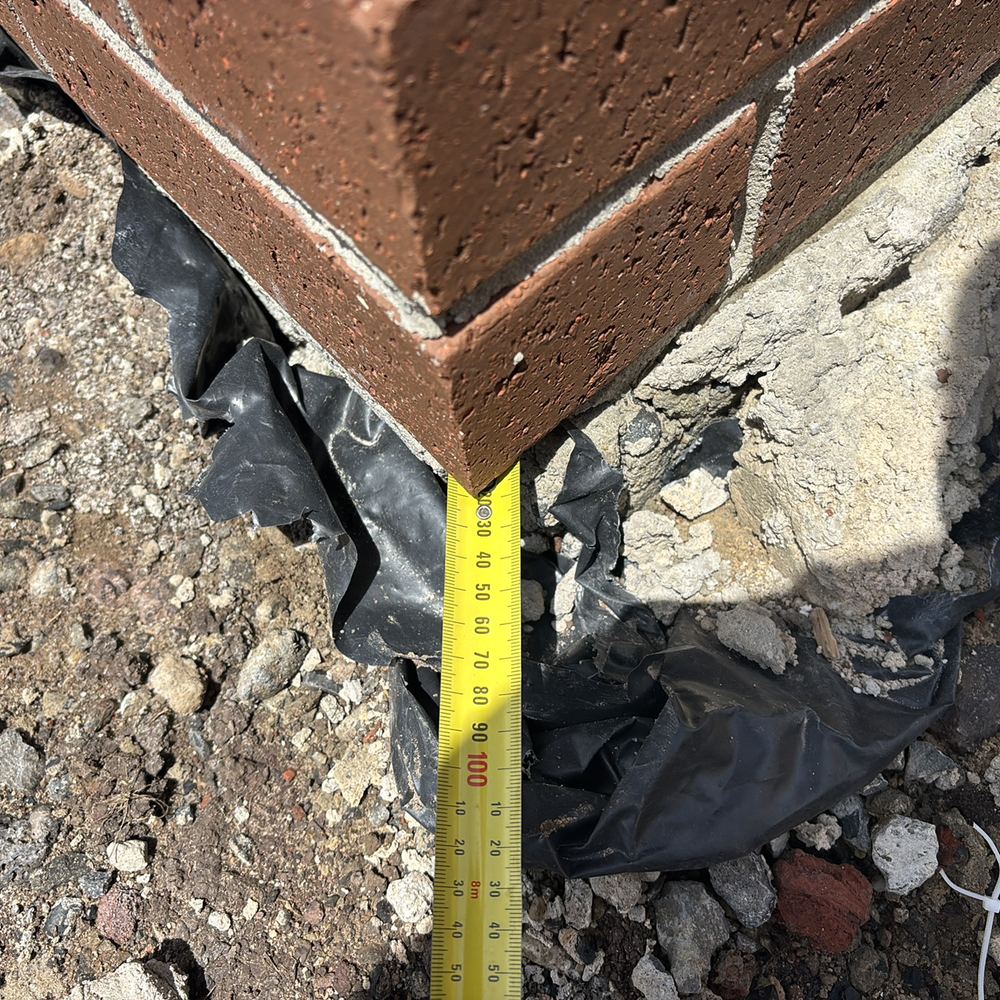 Bricks projecting more than 15mm past the edge of the slab, found during a construction stage inspection in Sunbury