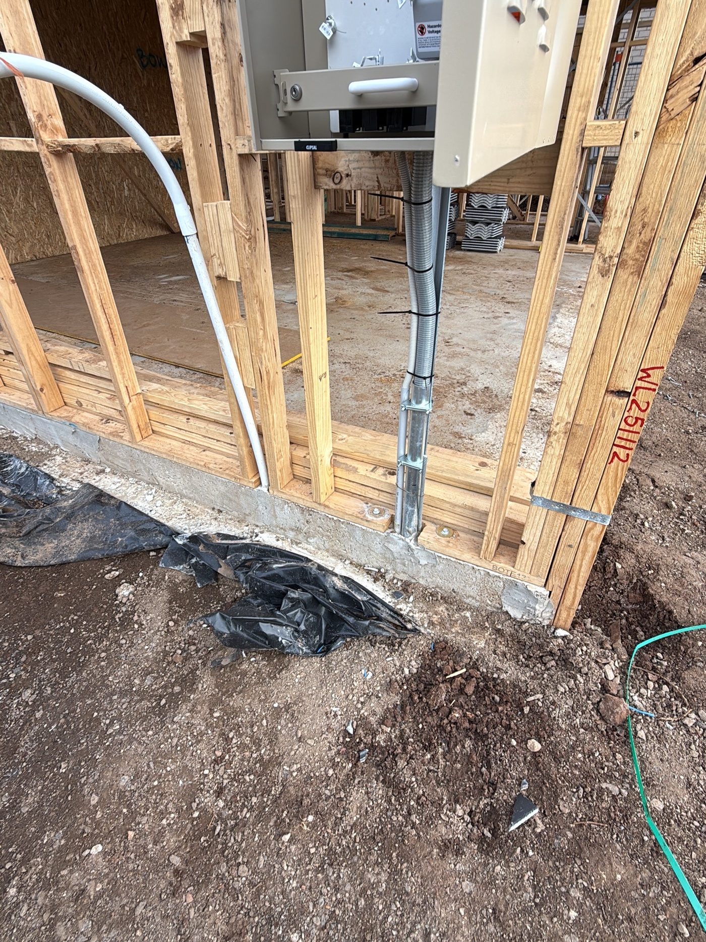 Honeycombing along the slab edge, voids that can weaken the concrete, found during a frame inspection in Sunbury