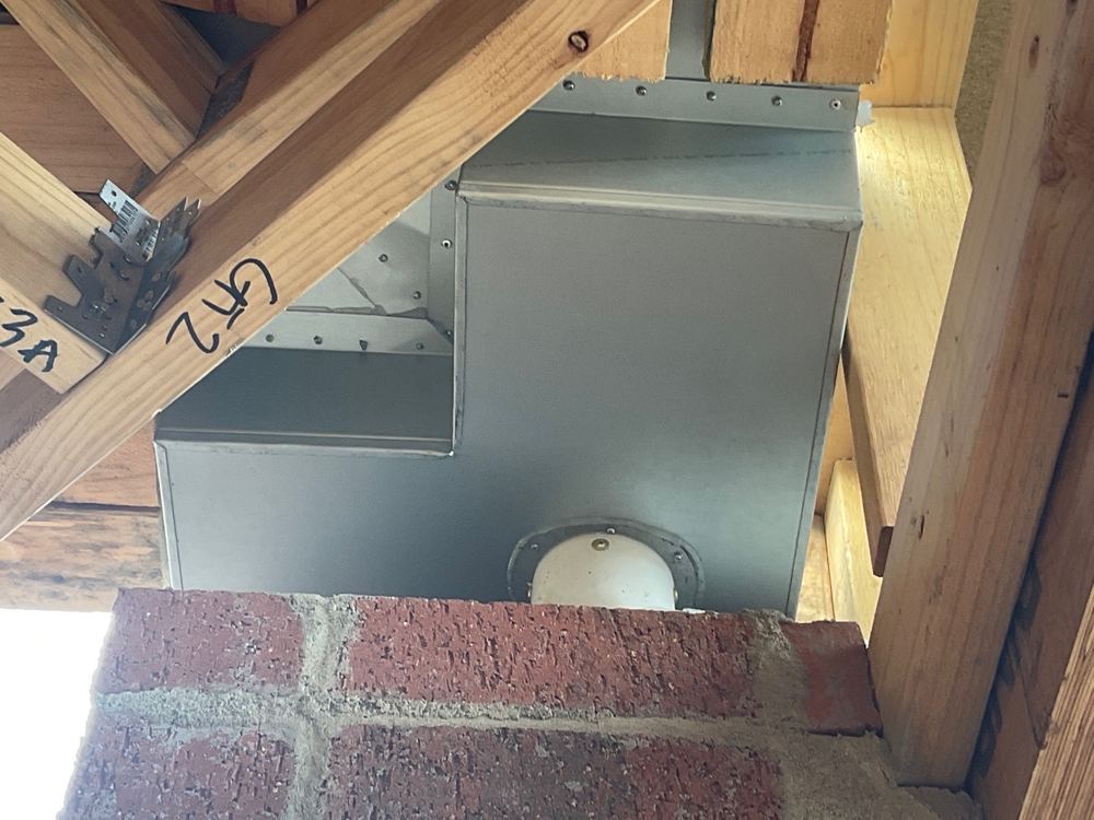 Box gutter sump sitting with nothing supporting it from below, found during a lock-up inspection in Sunbury