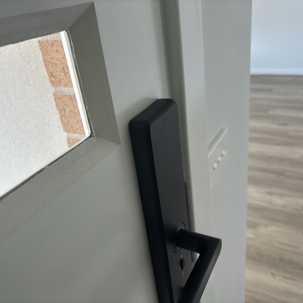 Front door hung in reverse, with the glazing beads on the outside, found during a pre-handover inspection in Sunbury